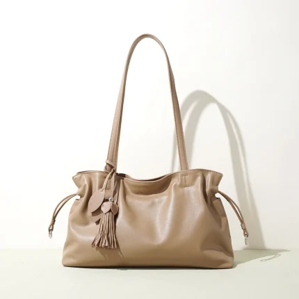 Women's Premium Top-Grain Cowhide Drawstring Tote Bag with Tassel Charm Large Capacity Daily Commuter Shoulder Crossbody Bag